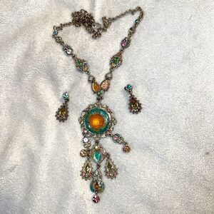 Beautiful and colorful necklace and pierced earrings set.